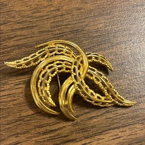 Trifari Gold Swirl Brooch